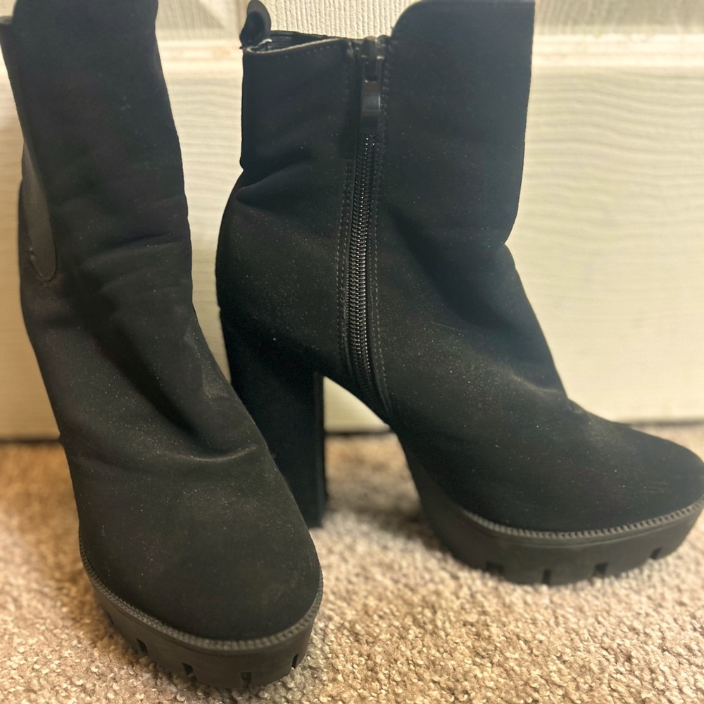 High heel boots color black only wore once.
